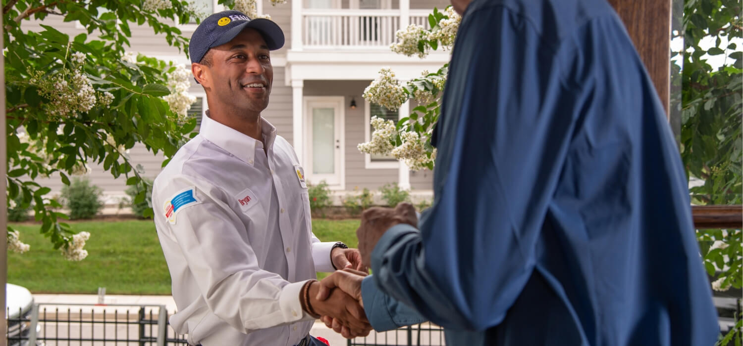 technician greeting customer