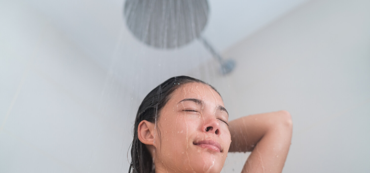 taking shower from water heater