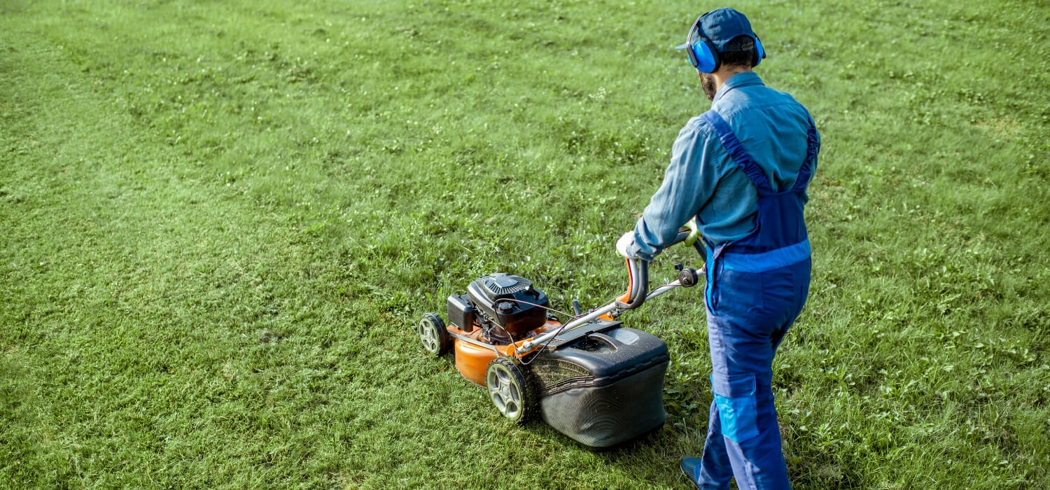 mower wearing protective hearing