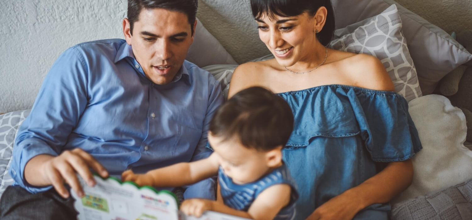 family reading bedtime story enjoying hvac replacement