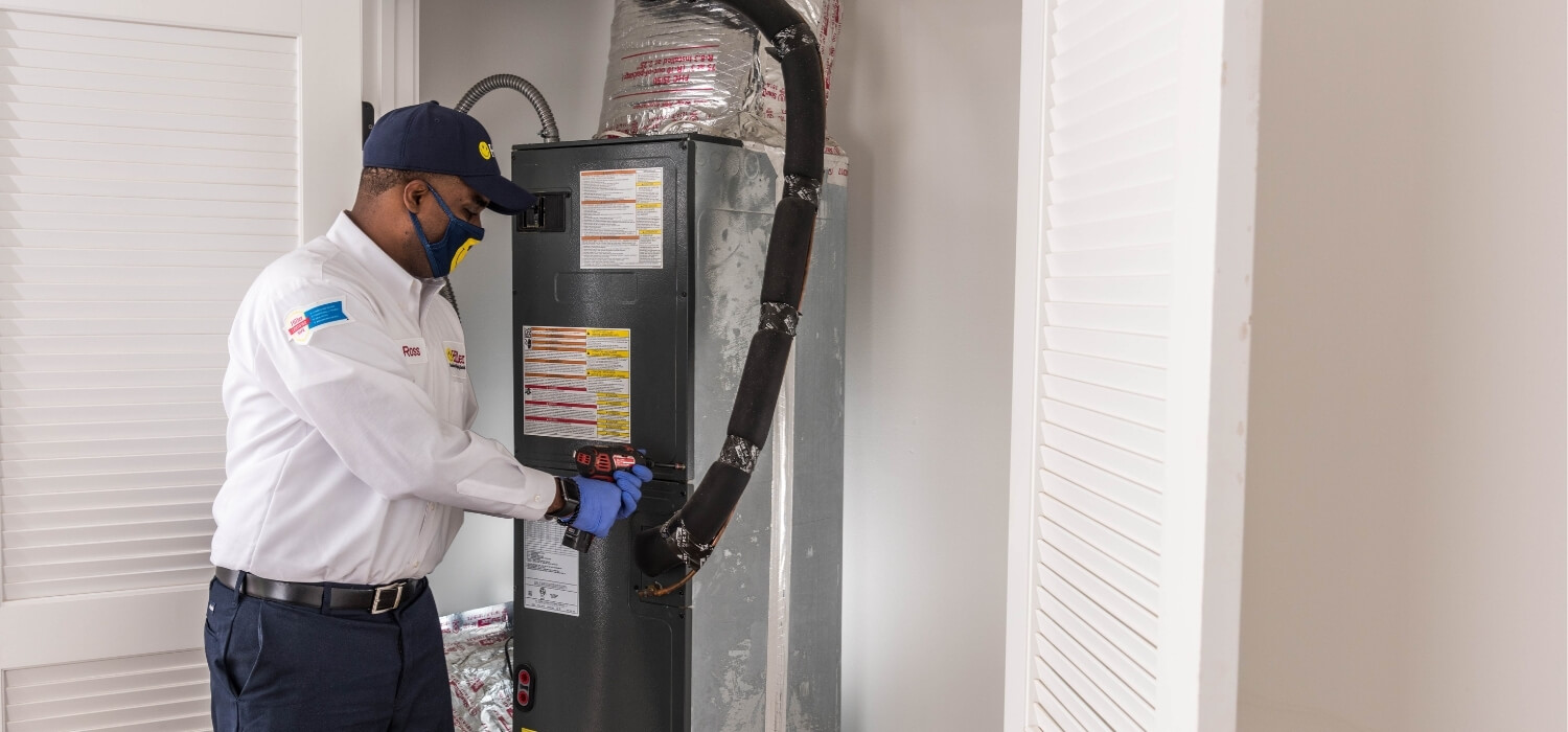 HVAC Technician Completing Furnace Repair