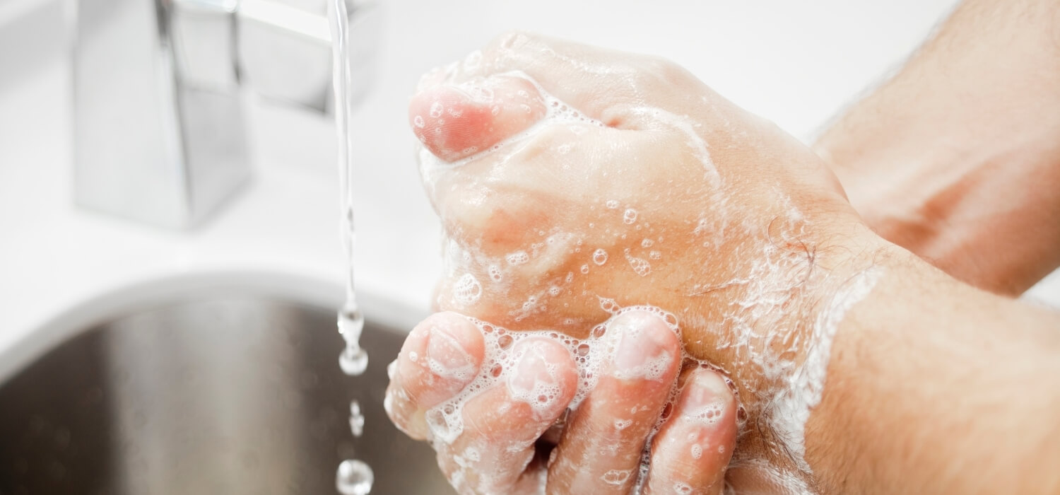 Homeowner Washing Hands with Low Water Pressure