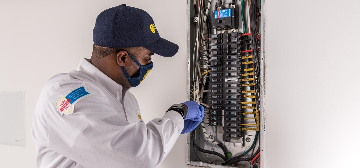 Electrician Working on Overloaded Circuit