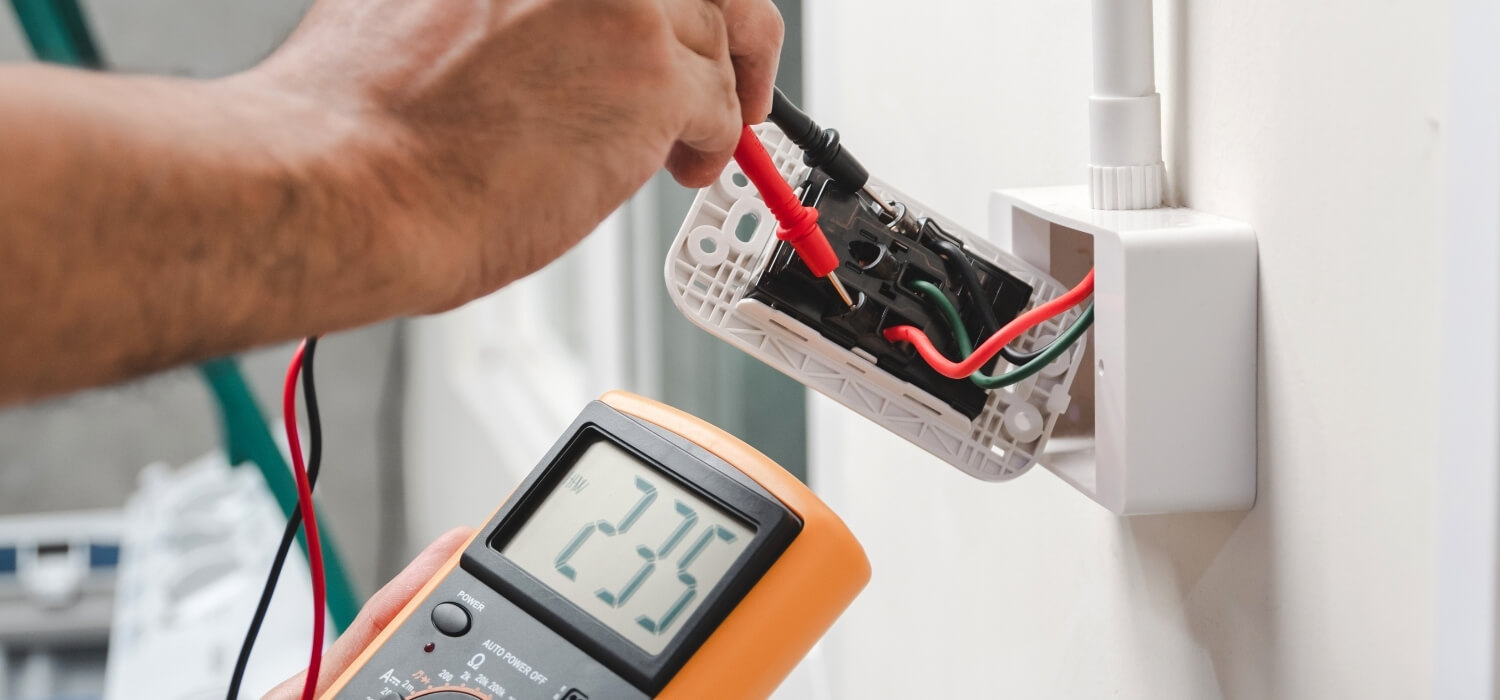 Homeowner Reading Voltage on Socket