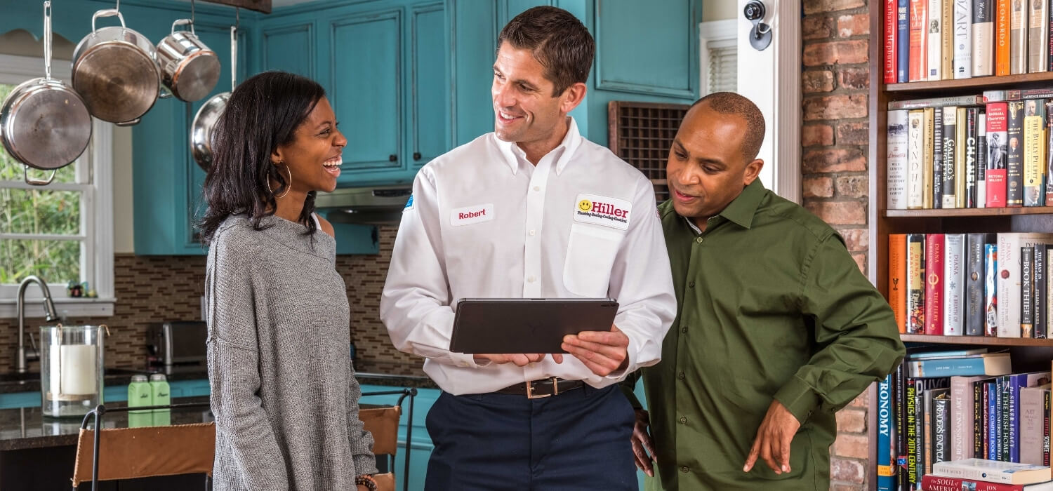 Hiller Electrician Talking to Homeowners