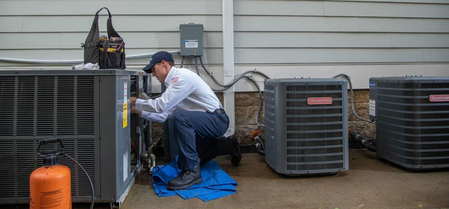 HVAC Technician Performing AC Maintenance