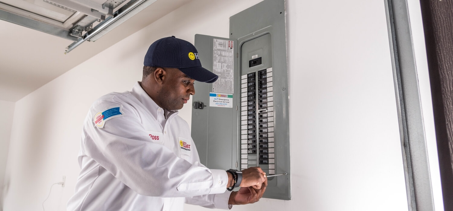 Electrician Replacing Circuit Breaker Panel