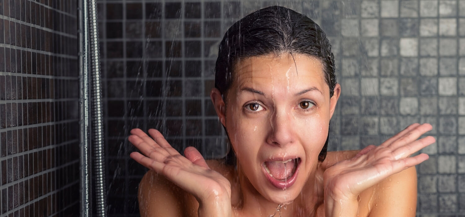 Lady Surprised with Cold Water in Shower