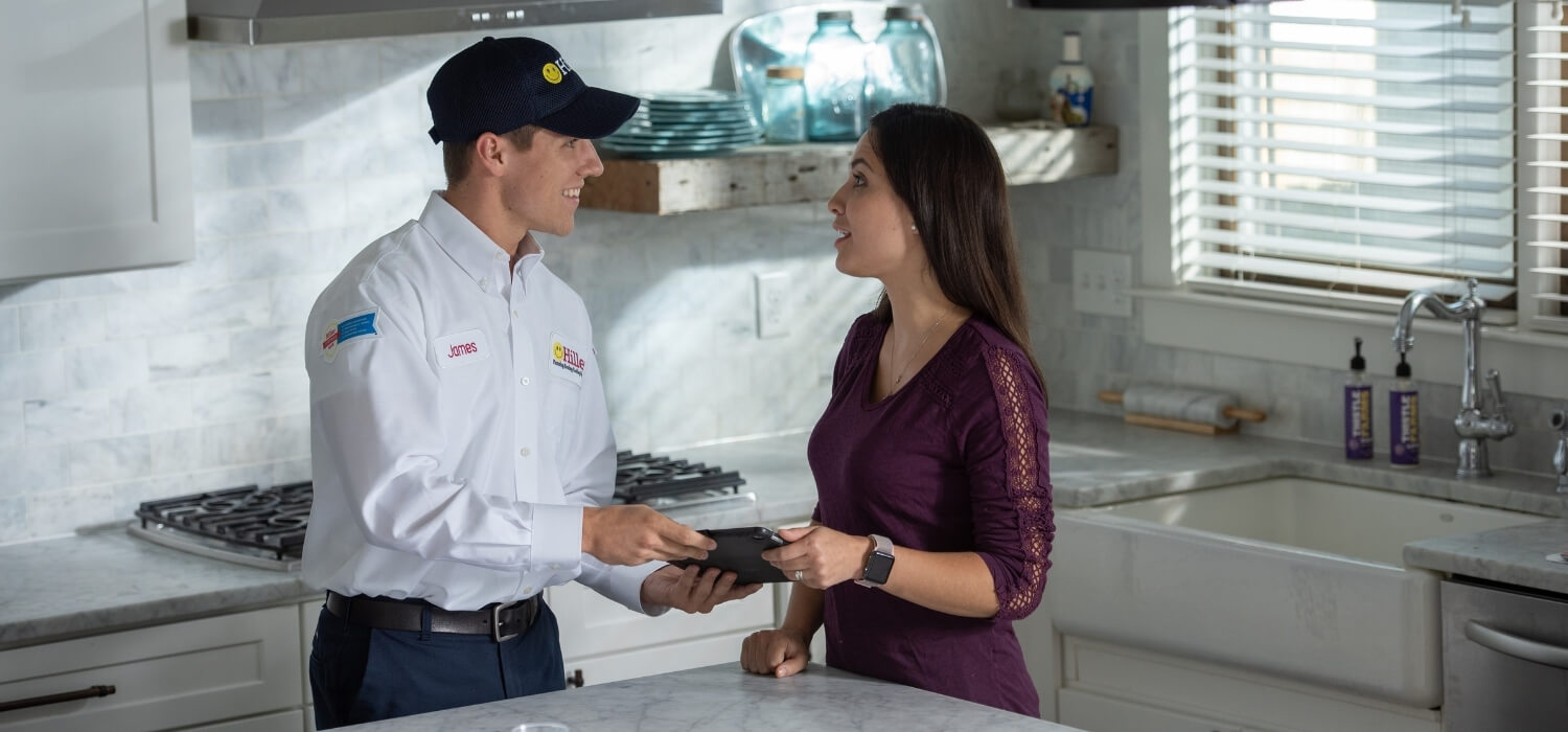 Technician Explaining HVAC Replacement Options