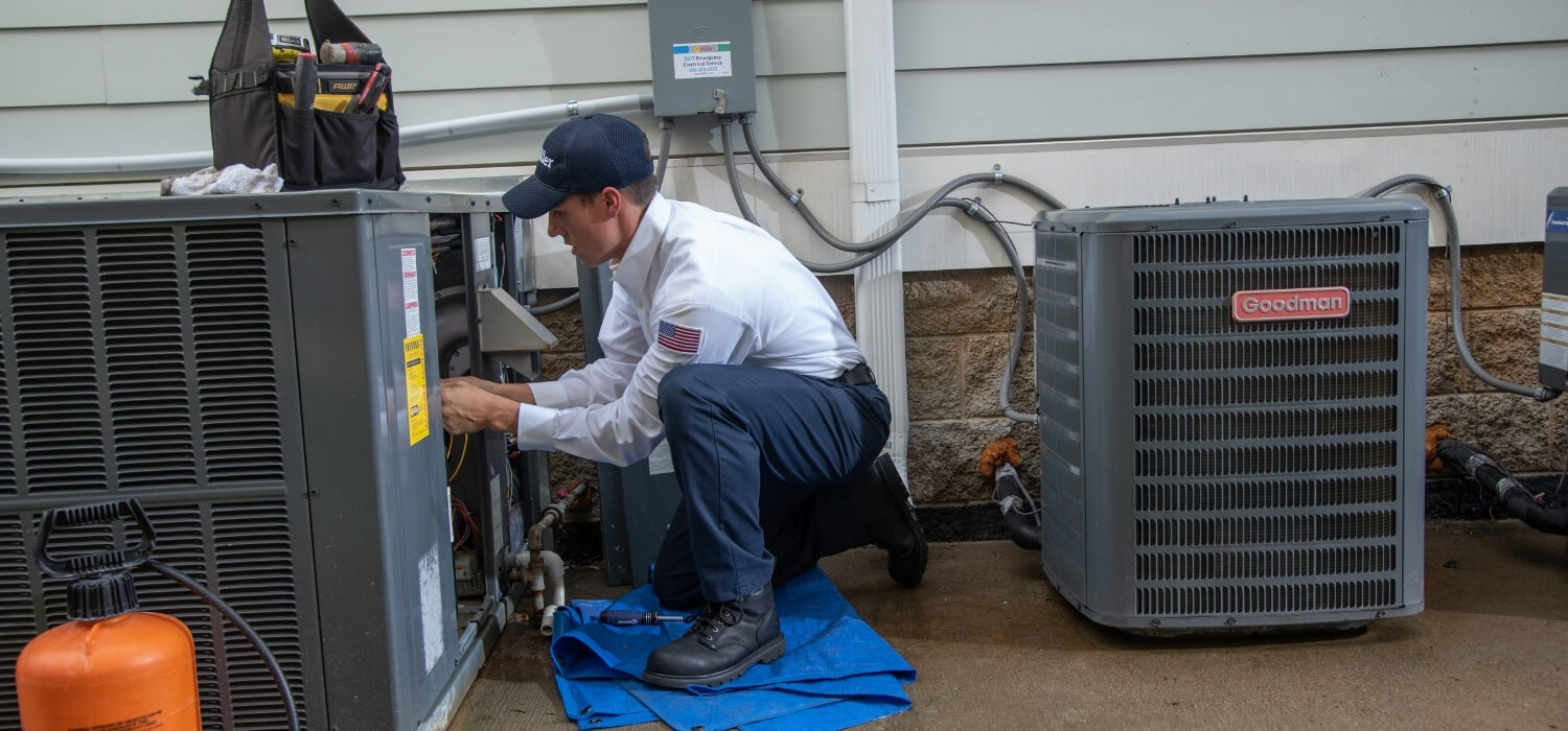 HVAC Technician Performing Maintenance